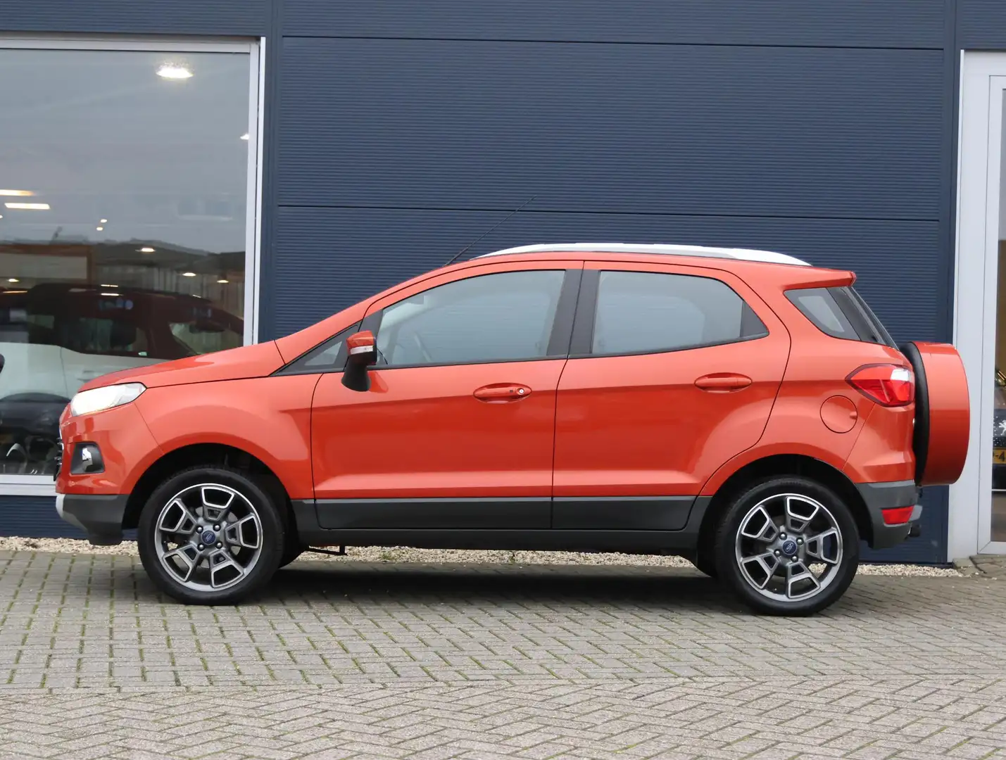 Ford EcoSport 125pk E.B. Titanium | 2de eigenaar | Parkeersensor Oranje - 2