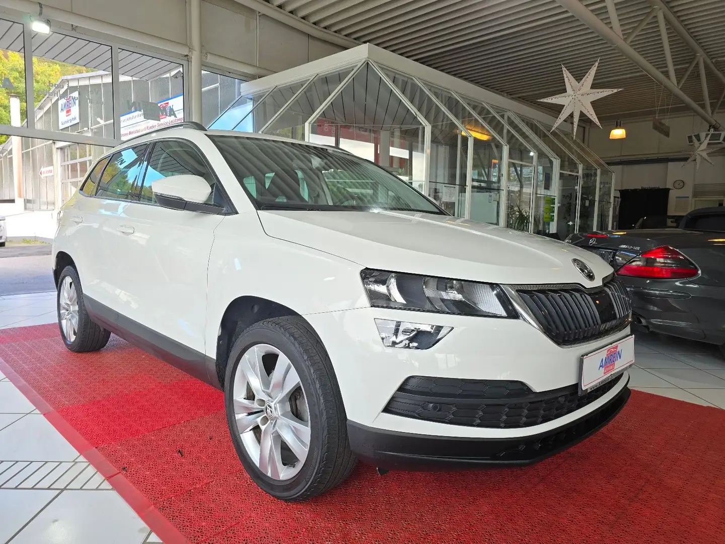 Skoda Karoq Style+SPORTSITZE+NAVI+KEYLESS GO+DAB+PDC+ Weiß - 1