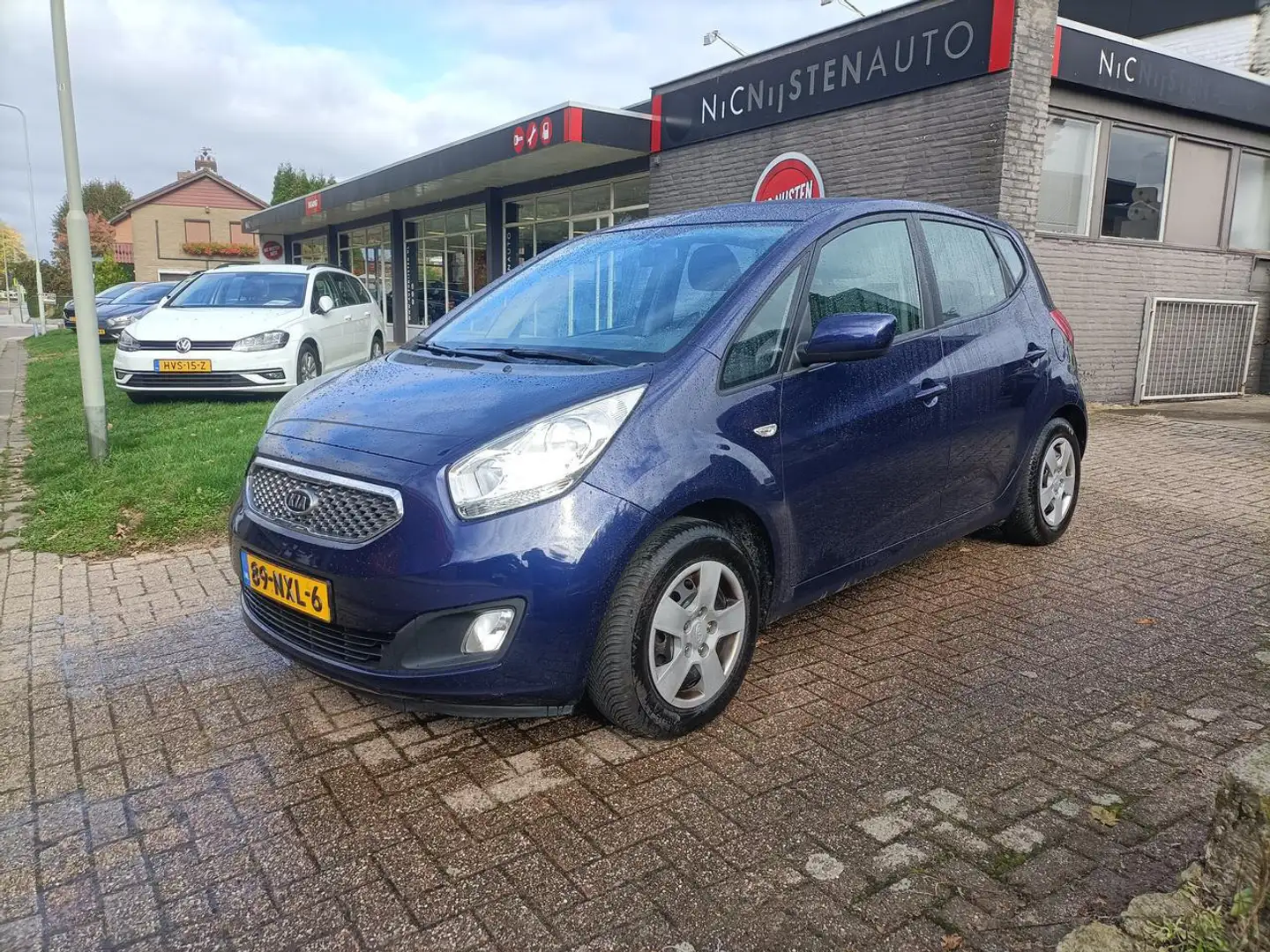 Kia Venga 1.4 CVVT Seven, Navi,Airco,Cruise,Trekhaak. Bleu - 1