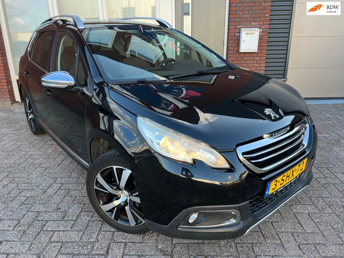 Peugeot 2008 1.6 VTi Féline / Pano / Leder / Navi / PDC / Cruis Zwart - 1