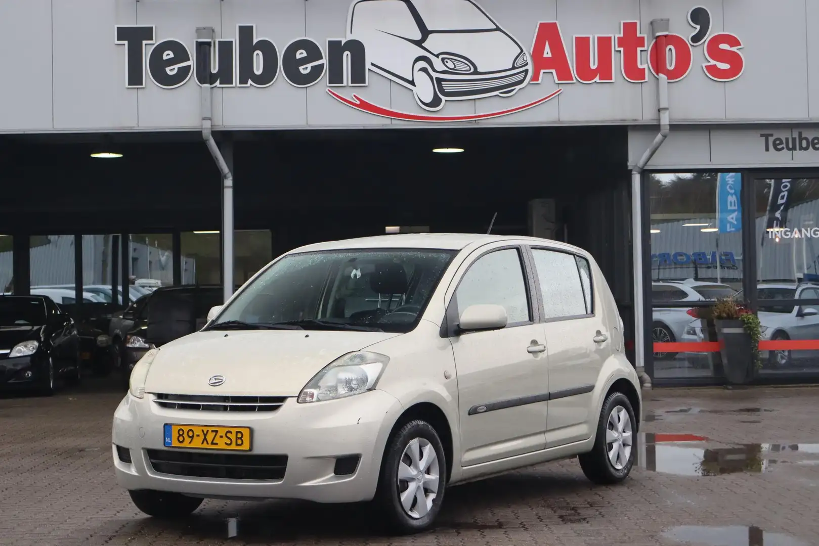 Daihatsu Sirion 2 1.3-16V Prestige Airco, Radio cd speler, Elektri Beige - 1