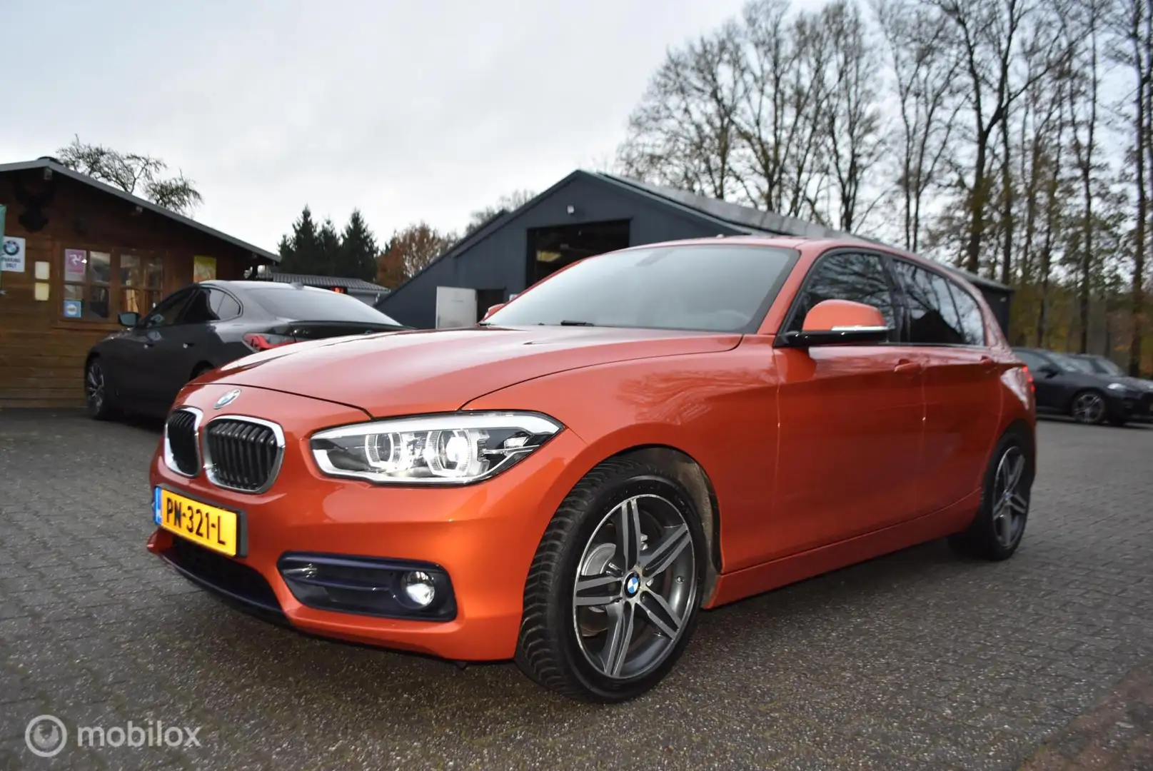 BMW 116 1-serie 116i High Exe Sportline Oranje - 2