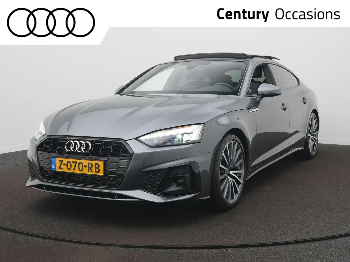 Audi A5 Sportback 35 TFSI S edition Competition S-Line | P Grijs - 1