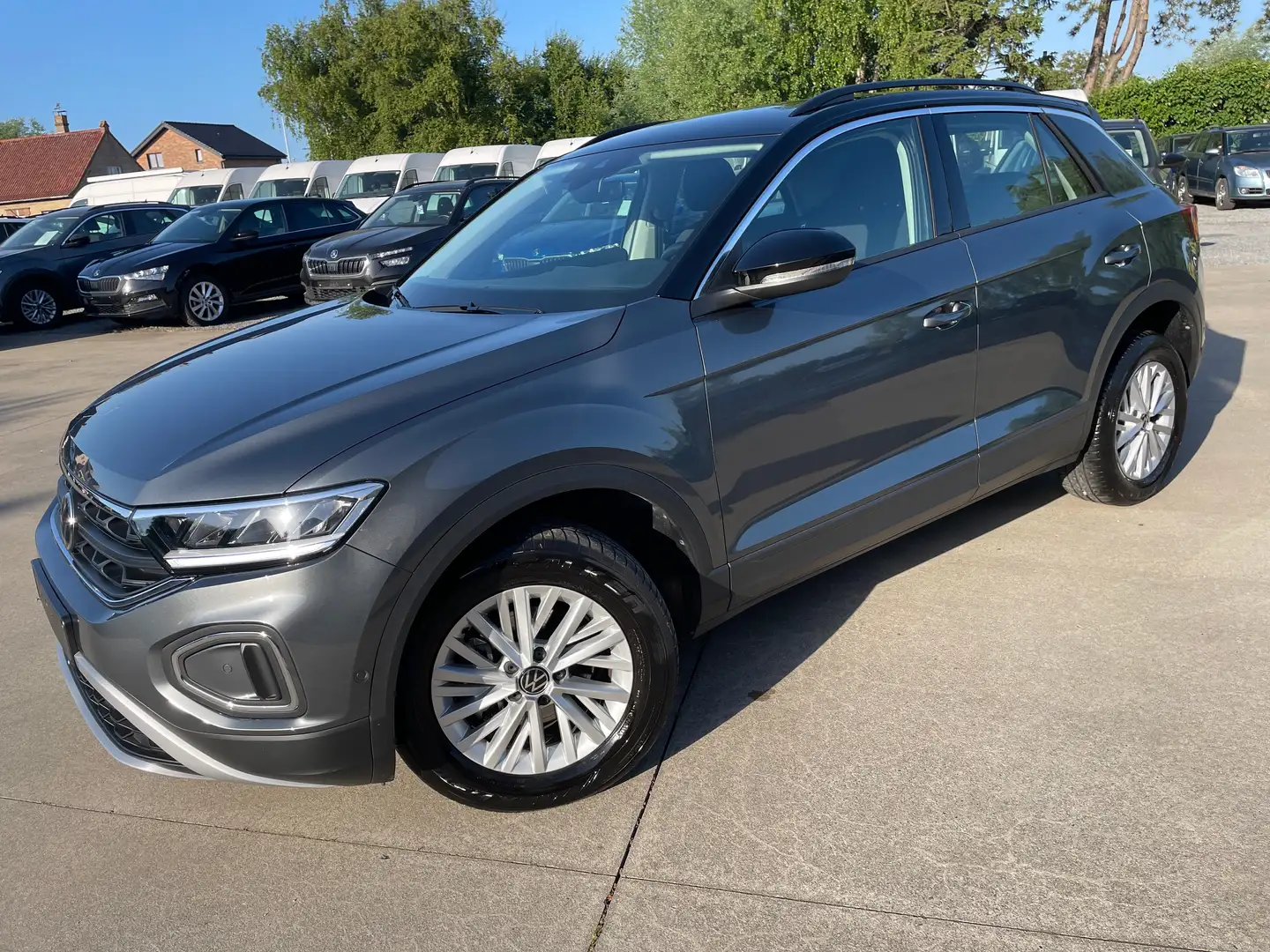 Volkswagen T-Roc 1.5 TSI Bi-Color DSG - automaat + GPS + Car Play Gris - 1