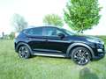 Hyundai TUCSON 1.6 T-Gdi 4WD Automatik / Premium / Navi / LED Zwart - thumbnail 4