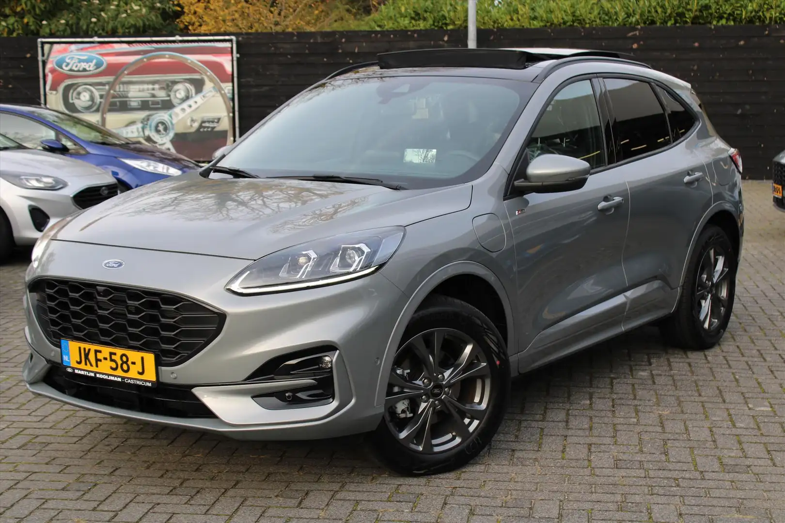 Ford Kuga 2.5 PHEV AUT 225pk ST-Line, Panoramadak, Driver As Grijs - 1