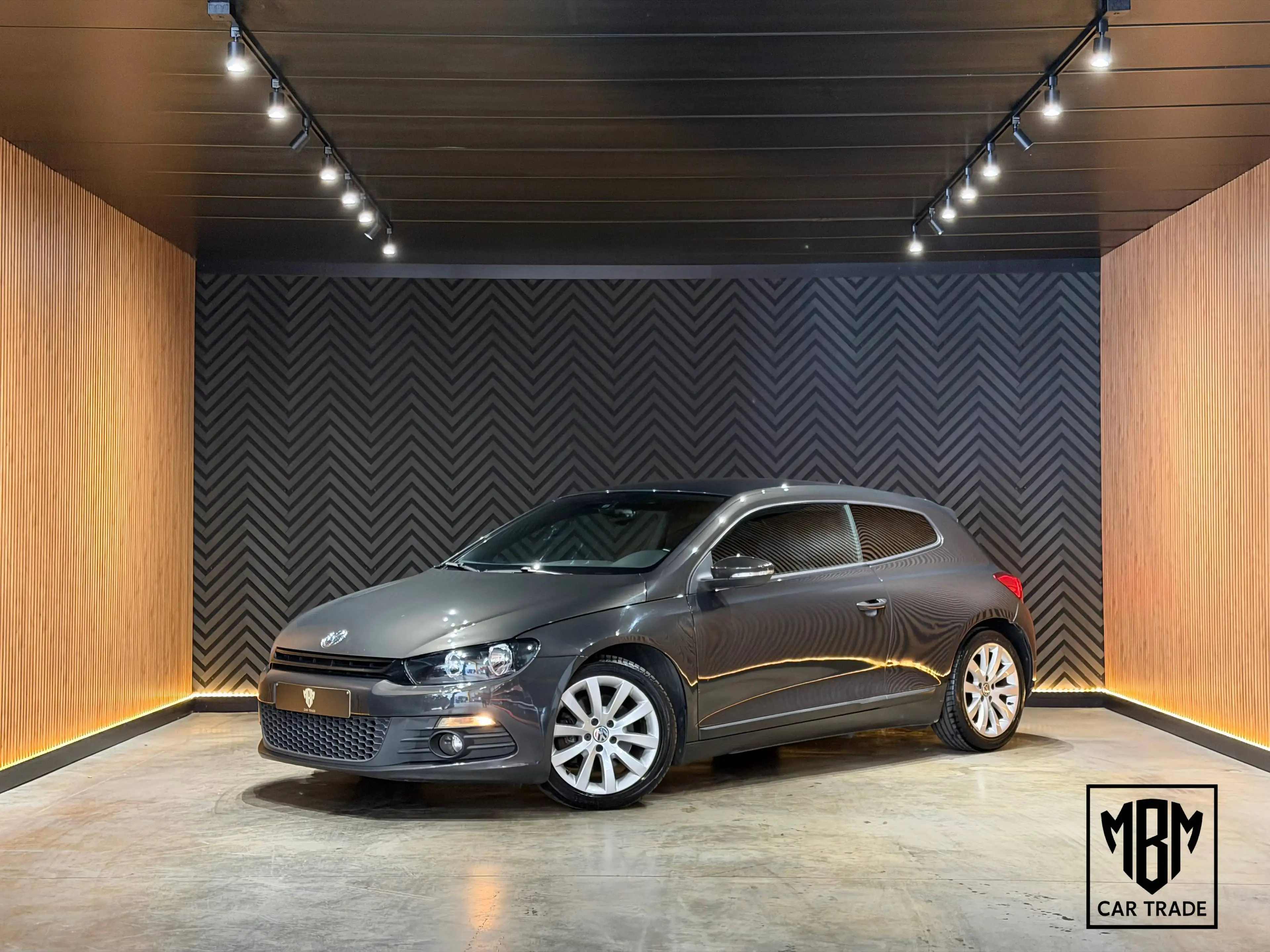 Volkswagen Scirocco ✅1.4 TSI 12 Maanden GARANTIE Airco Navi Zetelverwarming Cruise Control Parkeersensoren