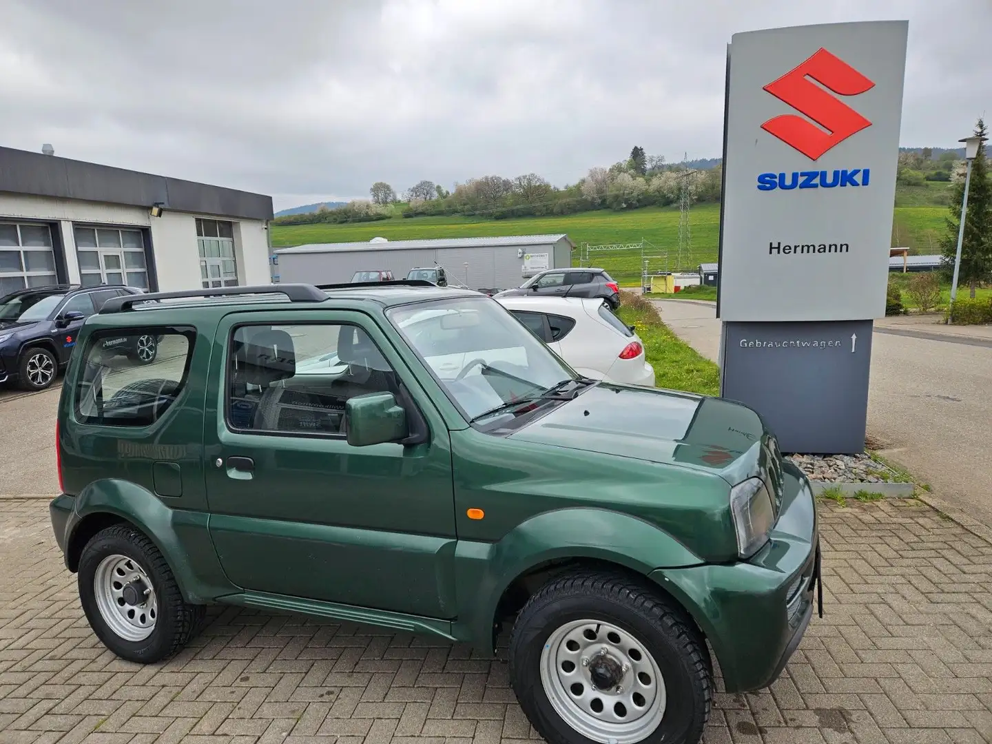 Suzuki Jimny 1.3 4WD Comfort *AHK&Klima* Verde - 1