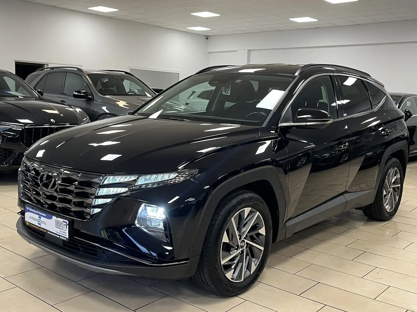 Hyundai TUCSON Trend 2WD*AHK*LED*Navi*CarPlay*R-Cam*SHZ* Negro - 1