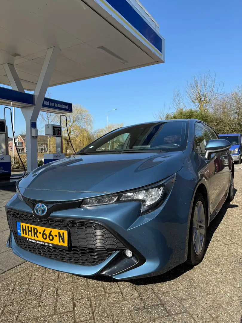 Toyota Corolla 1.8 Hybrid Active / Automaat / Bluetooth / Camera Modrá - 1