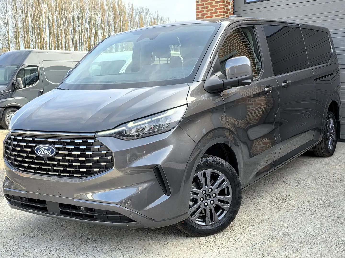 Ford Tourneo Custom 47.990EX - 9ZITS - NIEUW 0KM 2025 - 170PK Automaat Gris - 1