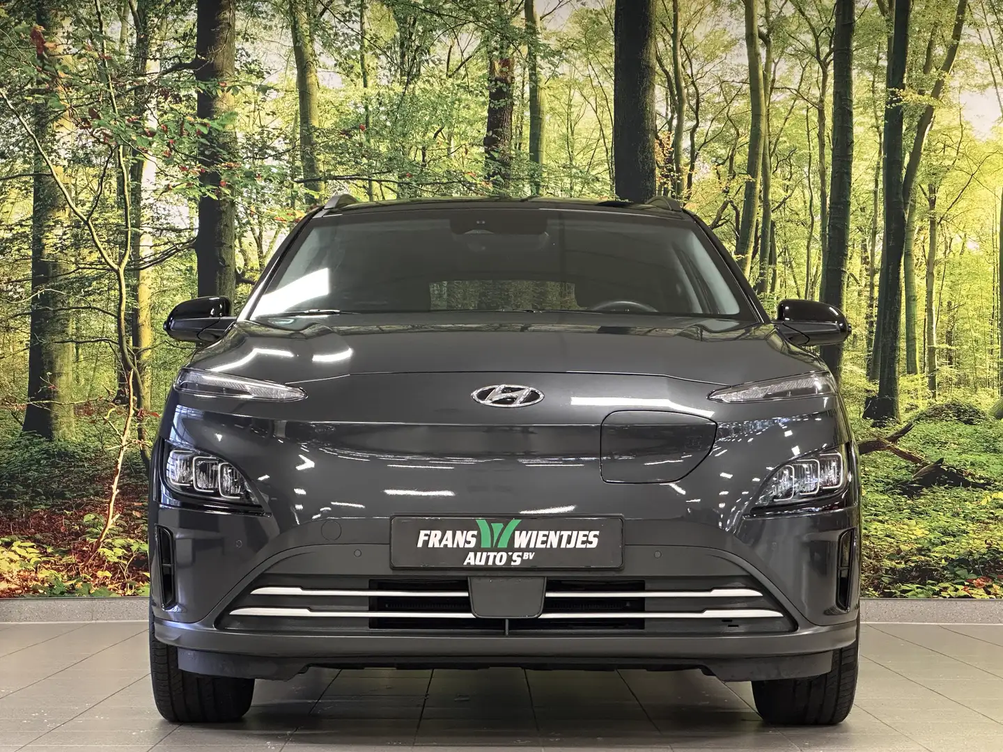 Hyundai KONA EV Comfort Smart 39 kWh | Parkeersensoren | Cruise Grijs - 2