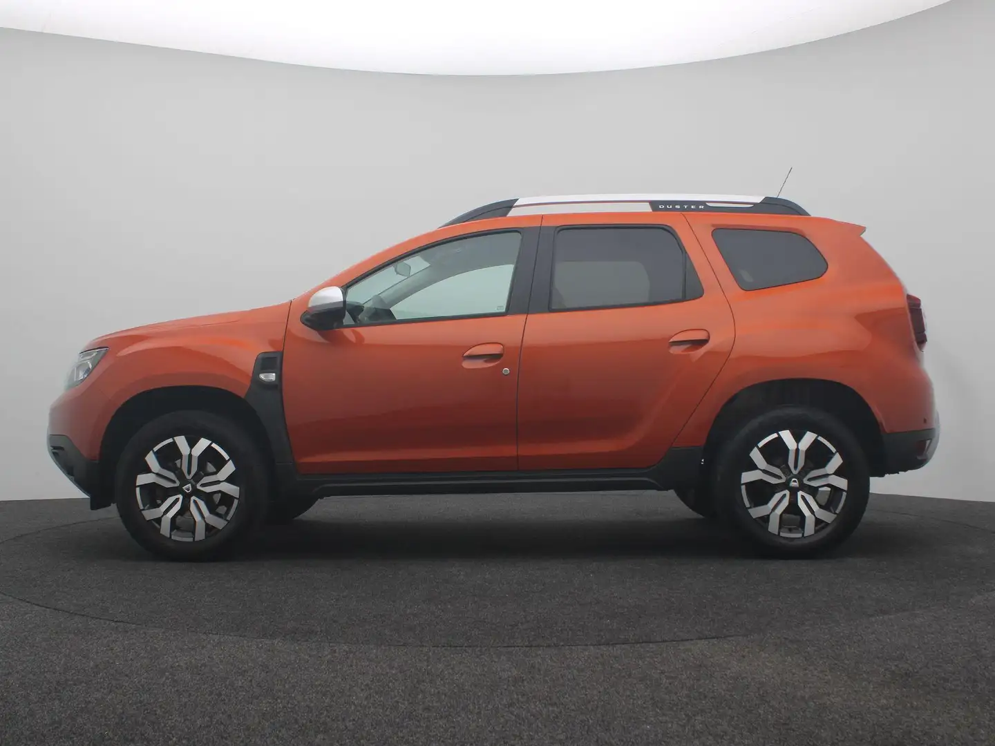 Dacia Duster TCe 100 Bi-Fuel Prestige | Parkeercamera | Navigat Oranje - 2
