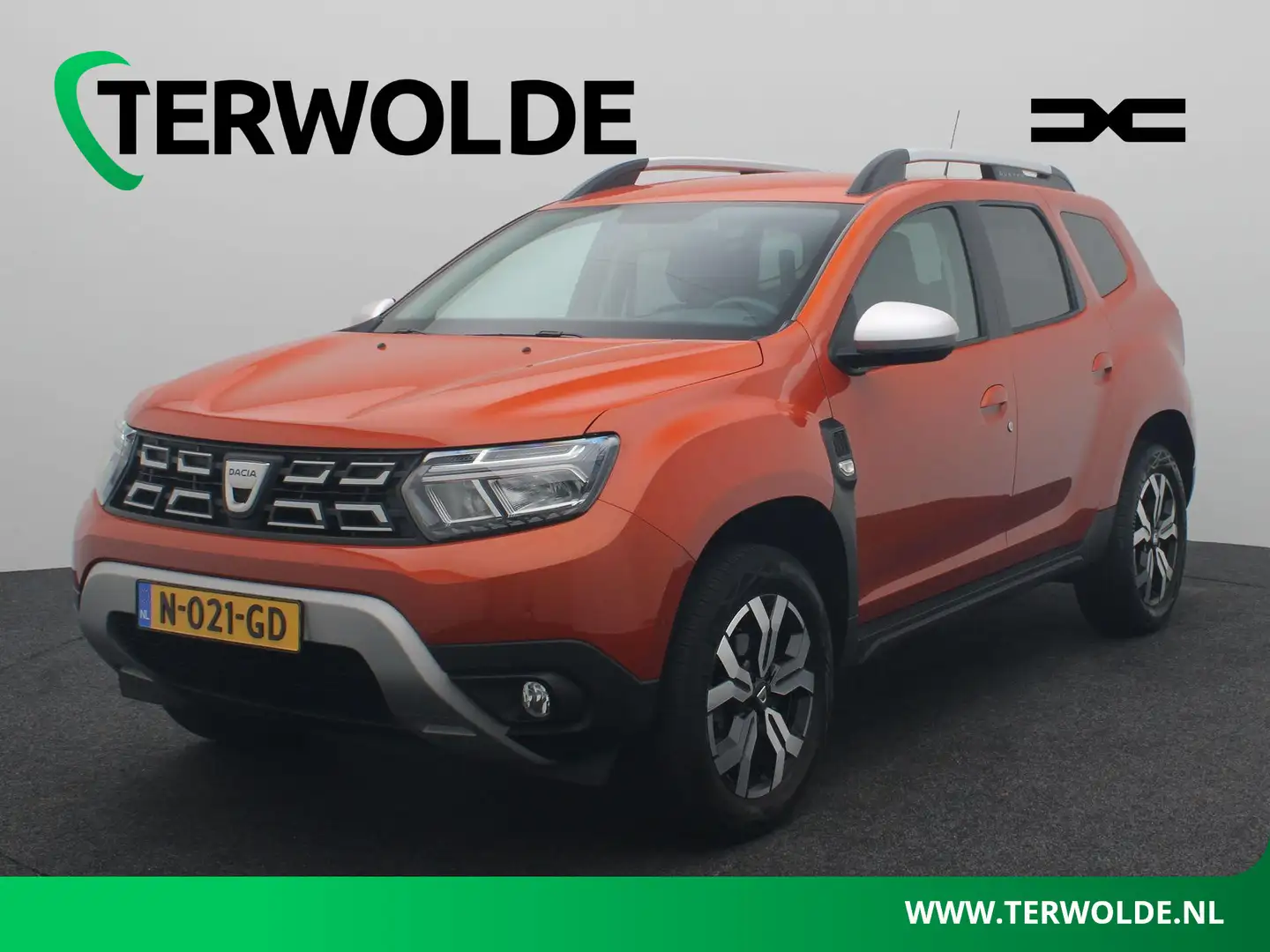 Dacia Duster TCe 100 Bi-Fuel Prestige | Parkeercamera | Navigat Oranje - 1