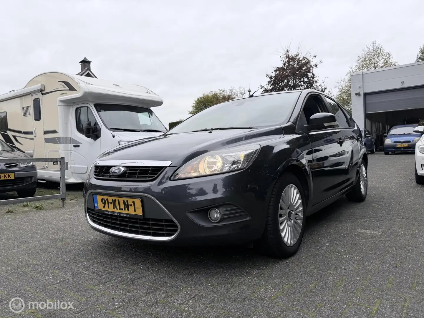 Ford Focus 1.8 Limited Flexi Fuel Camera / LM / Cruise / PDC Grijs - 1