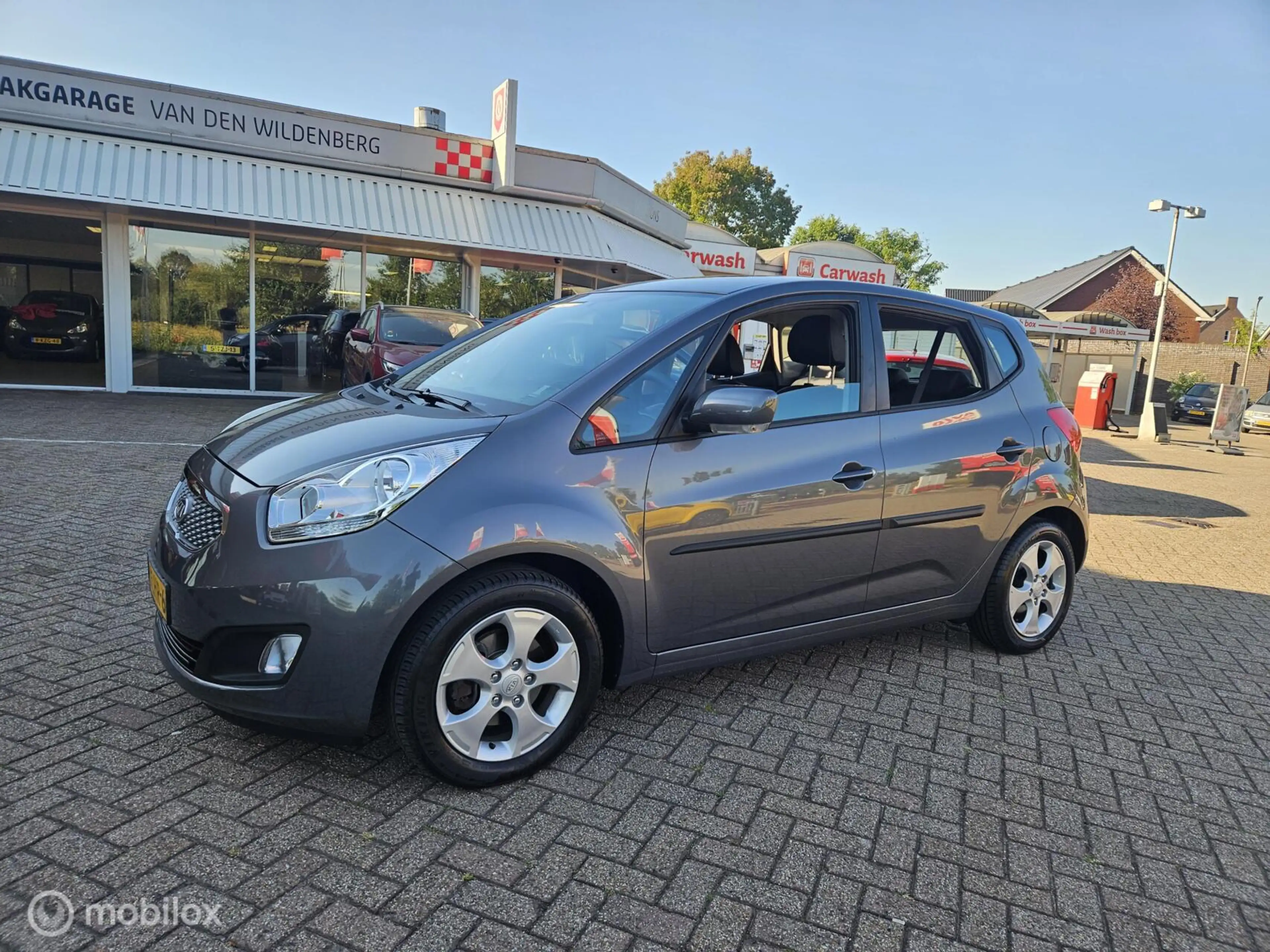 Kia Venga 1.6 CVVT X-ecutive — photo 9