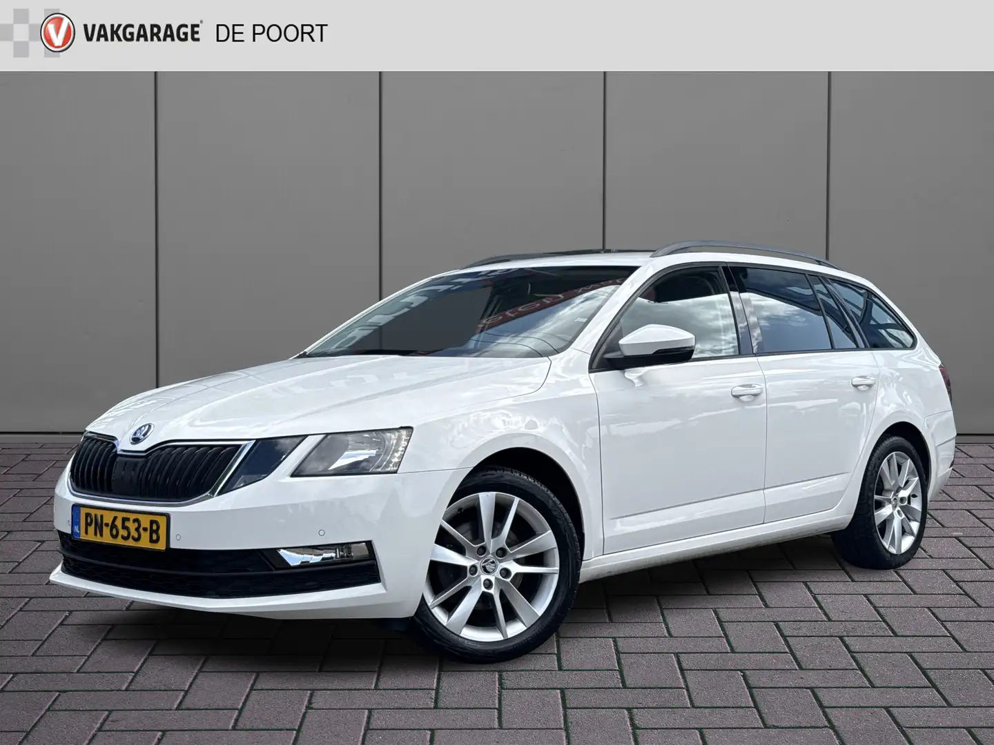 Skoda Octavia Combi 1.0 TSI Ambition Business | NL-auto | Navi | Wit - 1