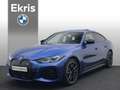 BMW i4 M50 High Executive M Sportpakket Pro 84 kWh / Schu Blauw - thumbnail 1