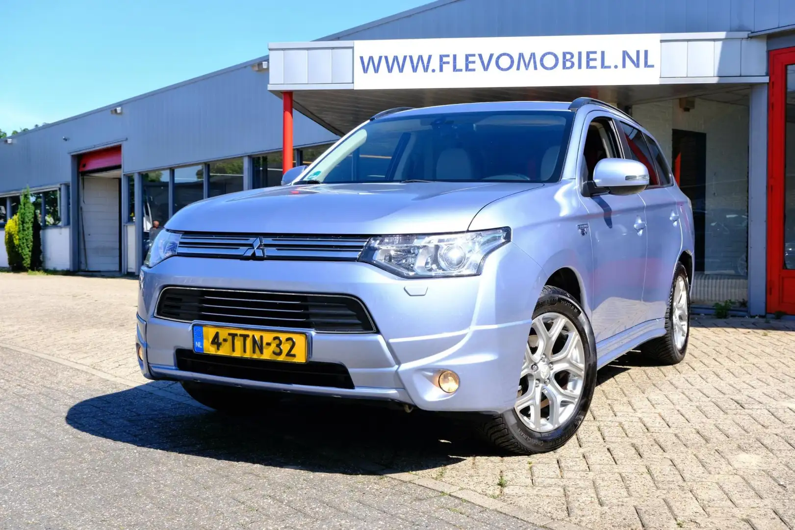 Mitsubishi Outlander 2.0 PHEV Instyle Aut. Pano|Leder|Navi|Cam Blauw - 1