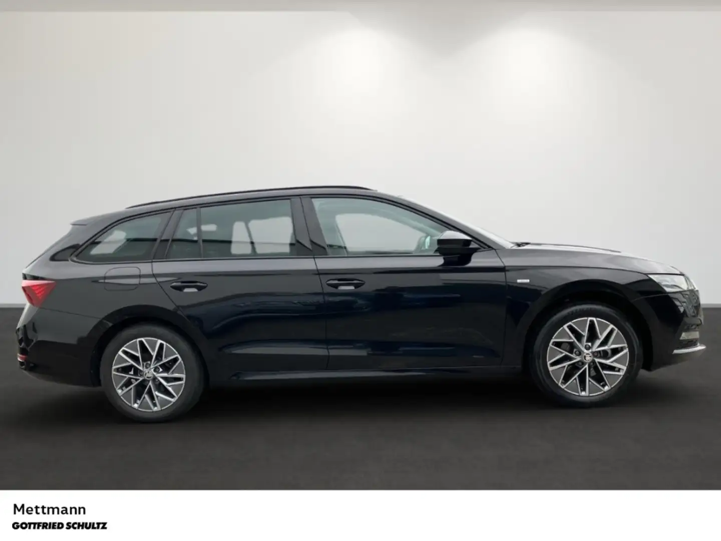 Skoda Octavia Combi Tour 1.5 TSI DSG NAVI SHZ PDC Schwarz - 2