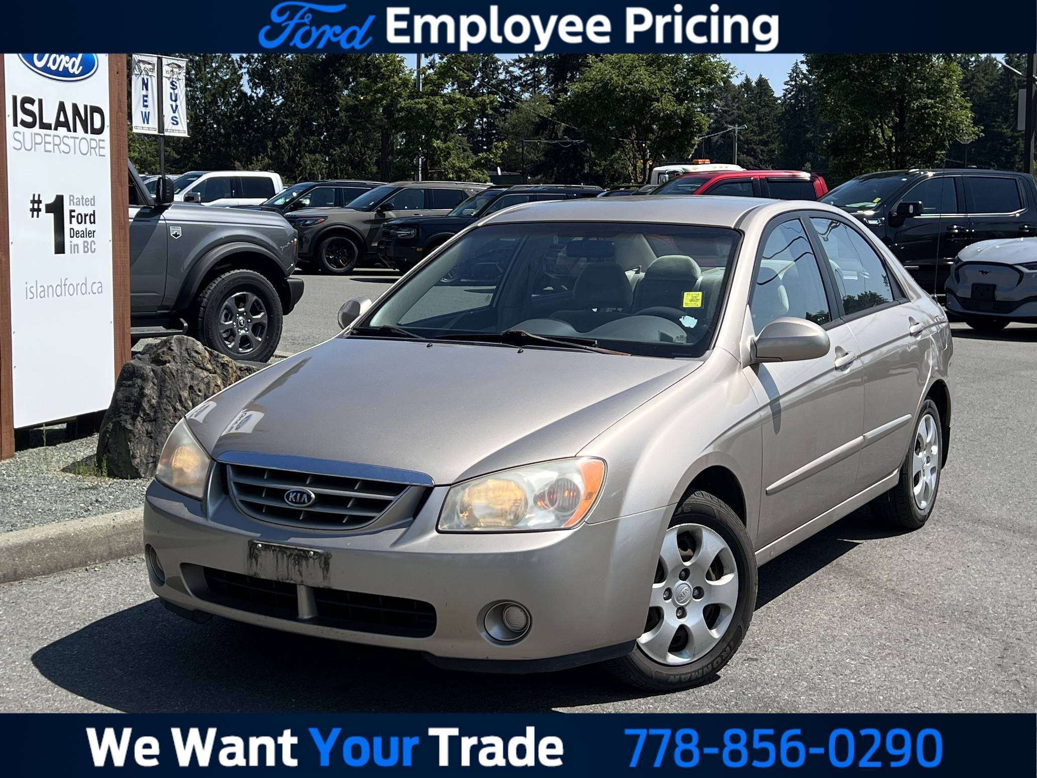 Black 2005 Kia Spectra Sedan Front-Wheel Drive Automatic