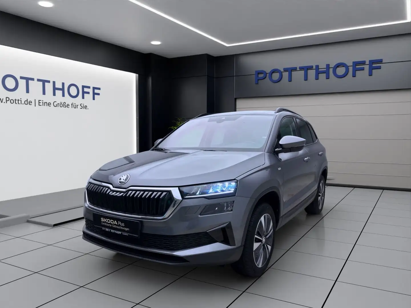 Skoda Karoq 2.0 TDI TOUR NAVI KAMERA PDC SITZHZG Grau - 1
