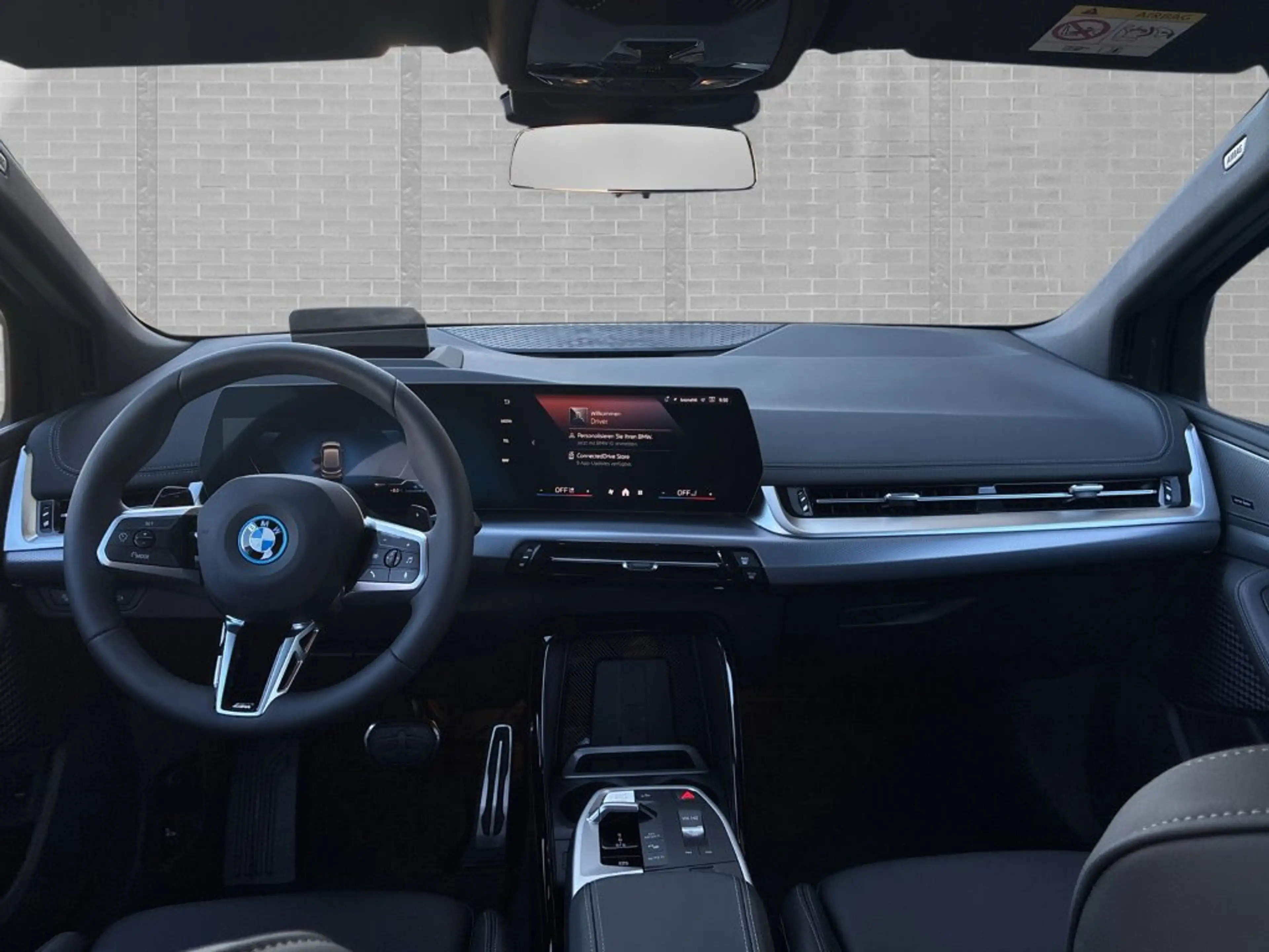 BMW 225 e xDrive — photo 7