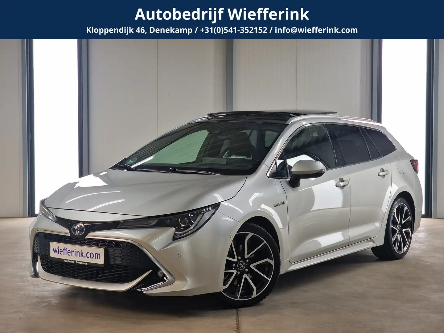 Toyota Corolla Touring Sports 2.0 Hybrid Premium 184pk | Trekhaak Grijs - 1