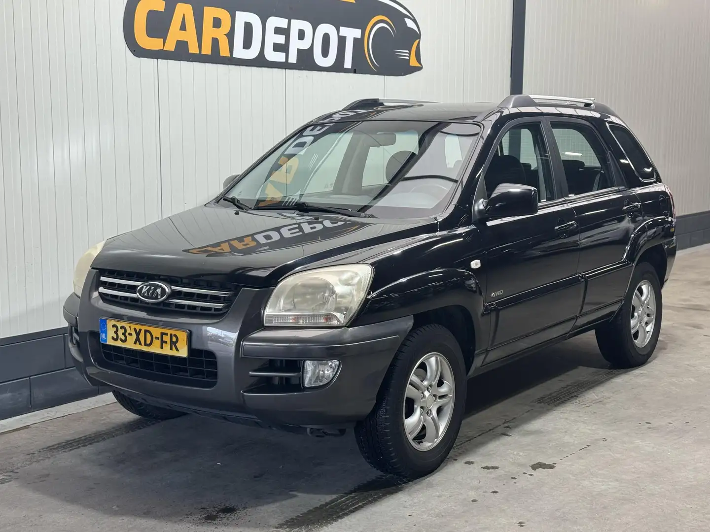 Kia Sportage 2.0 CVVT Adventure 4WD Super netjes 4X4 LPG Schwarz - 1