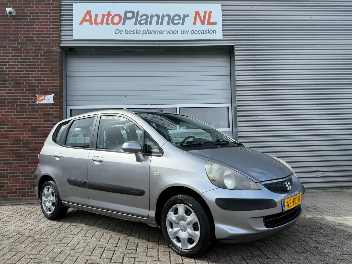 Honda Jazz 1.2 Cool! 5-Deurs! Airco! Nwe APK! 1e Eigenaar! Gris - 1