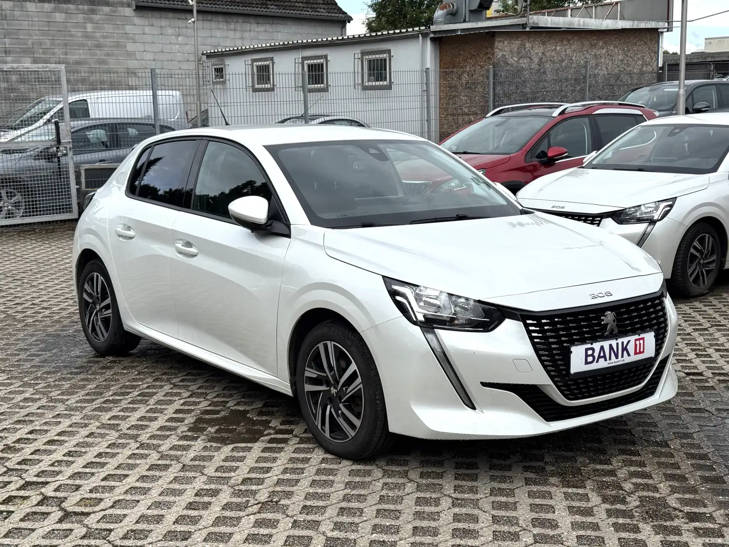 Peugeot 208 1,2i*1.Hand*Apple Carplay*Klima* Weiß - 1
