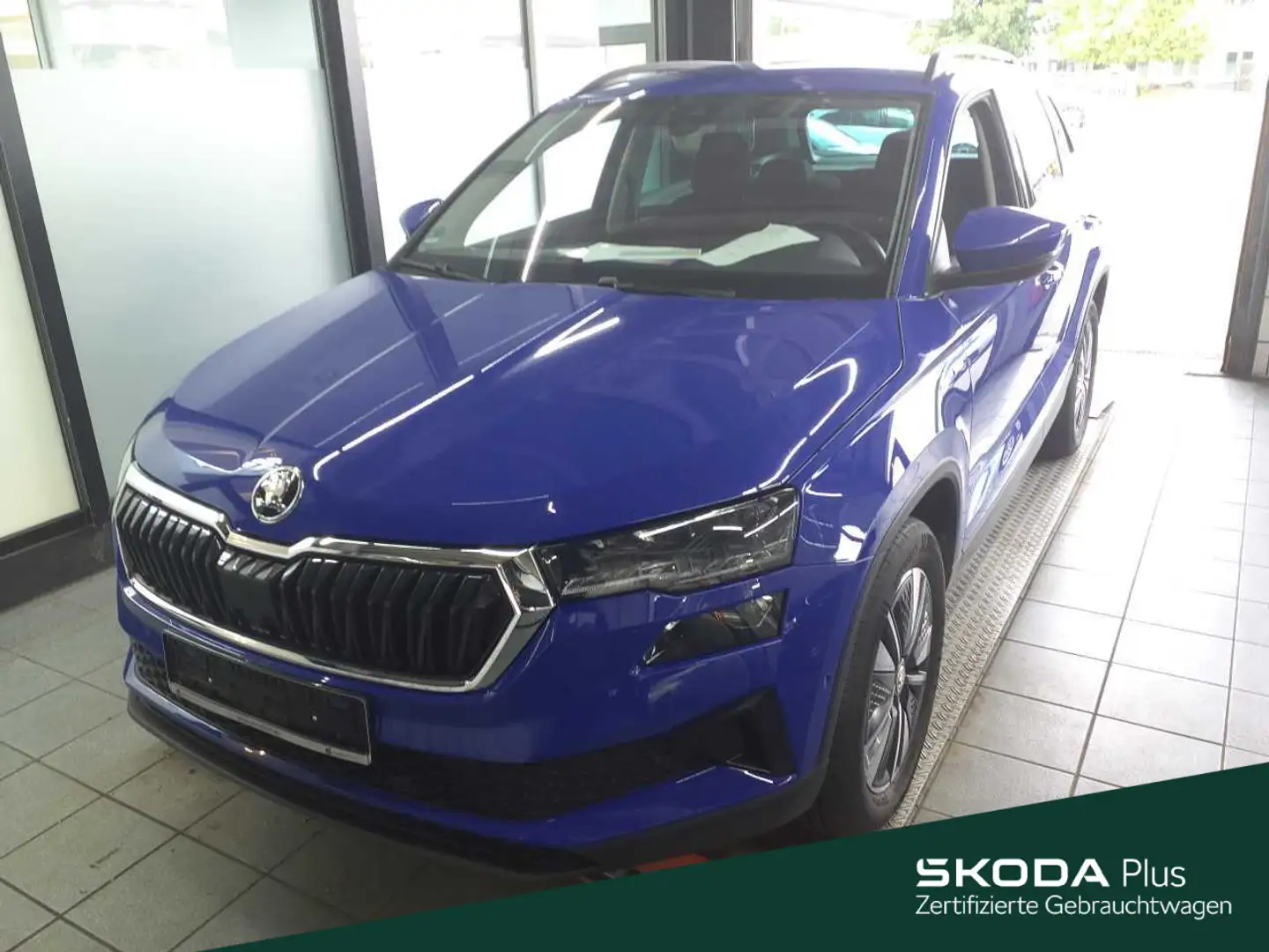 Skoda Karoq 2.0 TDI DSG 4x4 Tour*NAVI*AHK*STHZ*VARIOFL Blau - 1