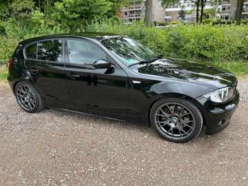 BMW E87 130i | KW | Origineel NL | handbak | 266PK