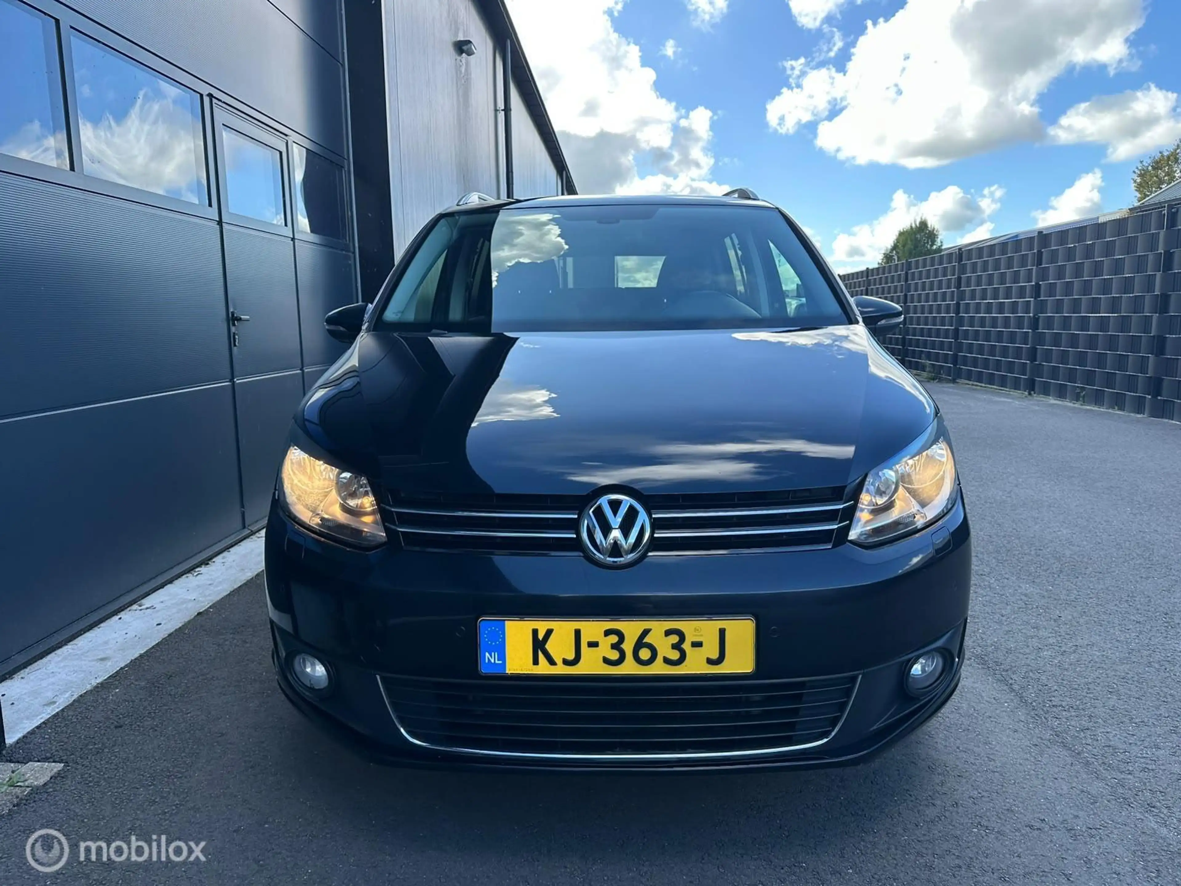 Volkswagen Touran 1.4 TSI Highline 7p. — photo 13