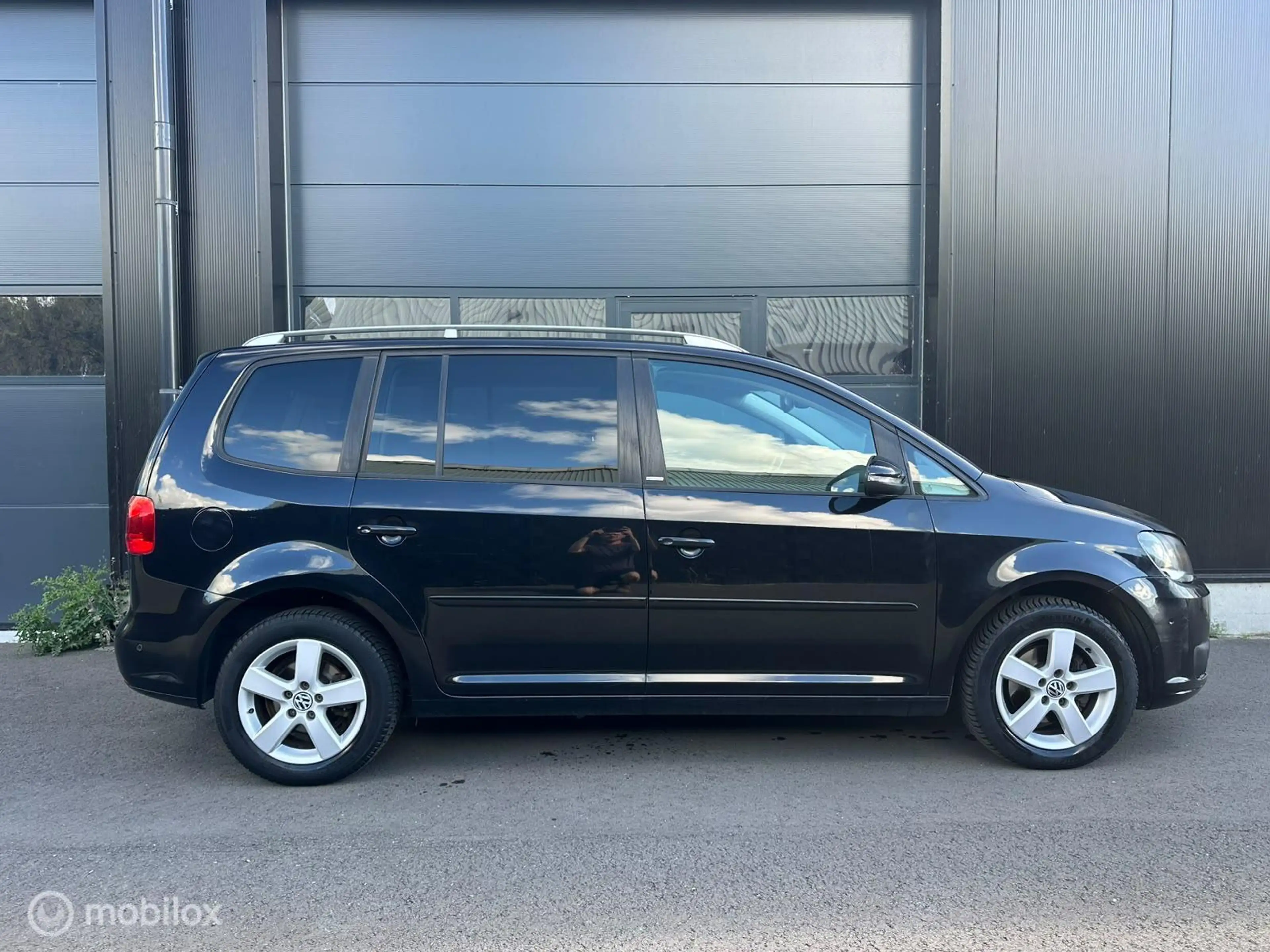 Volkswagen Touran 1.4 TSI Highline 7p. — photo 11