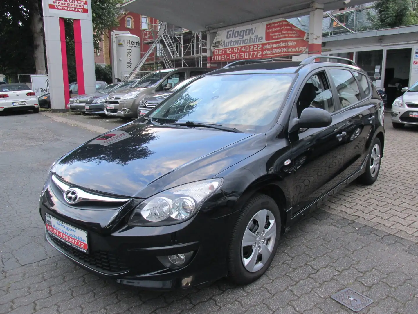 Hyundai i30 i30cw 1.4 Classic*ERST 156.000 KM*1 JAHR GARANTIE Schwarz - 1