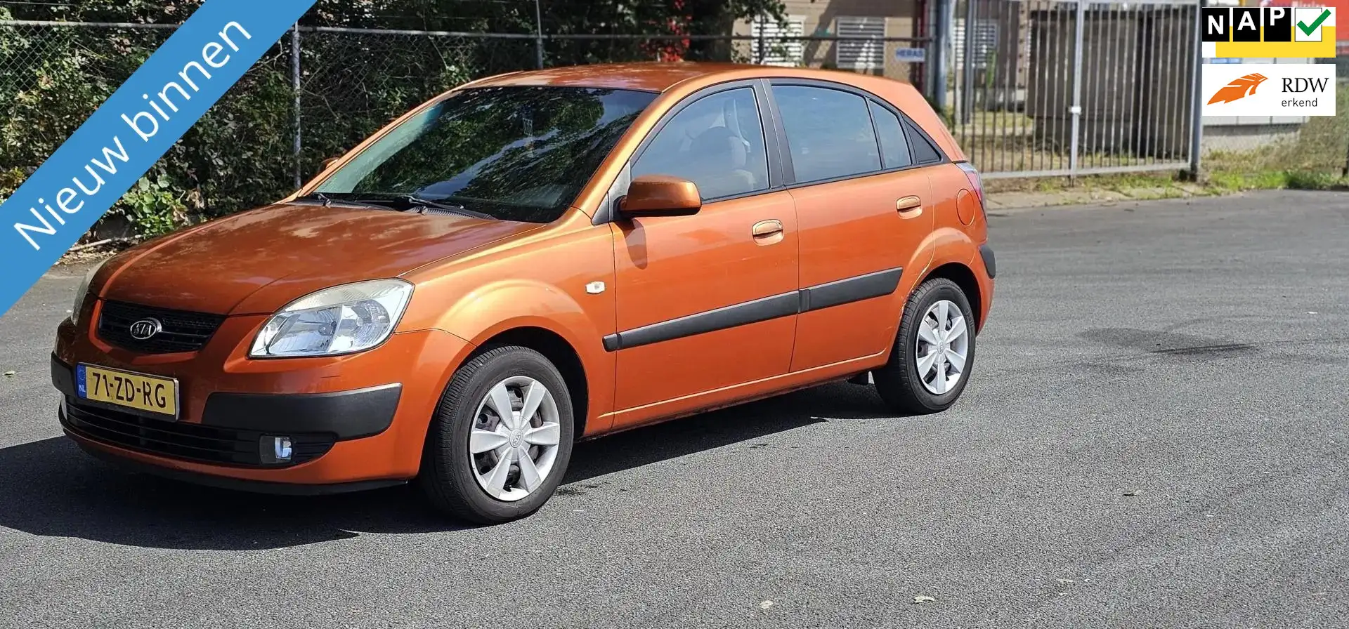 Kia Rio 1.4 X-tra Portocaliu - 1