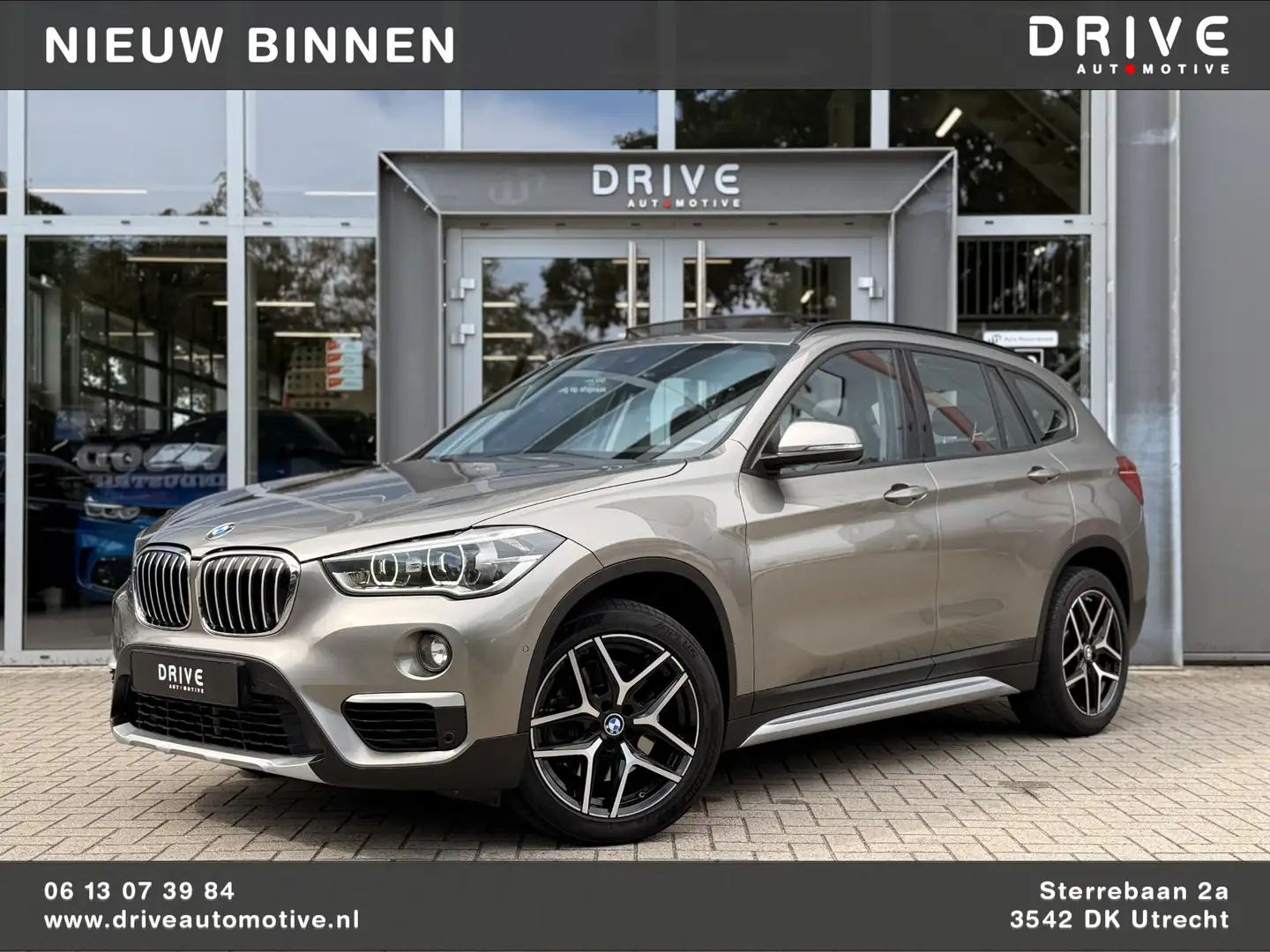 BMW X1 xDrive20i Centennial High Executive X Line Panoram Grijs - 1