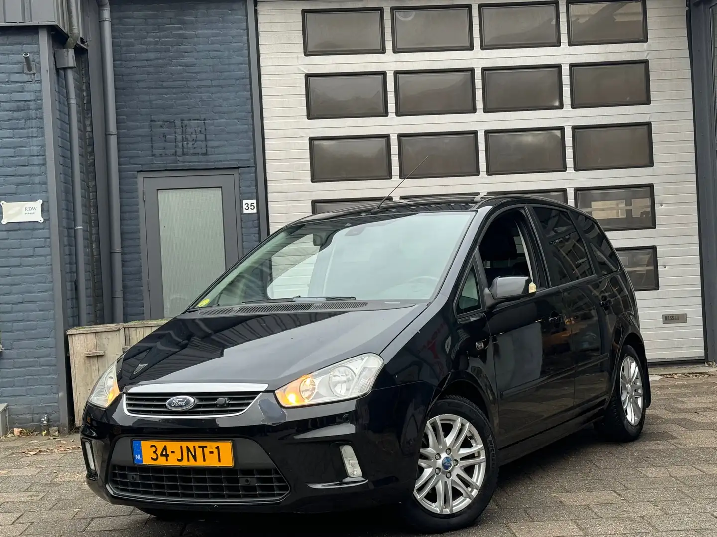 Ford C-Max 1.8-16V Ghia Flexifuel | Clima | Cruise | Navi | P Zwart - 1