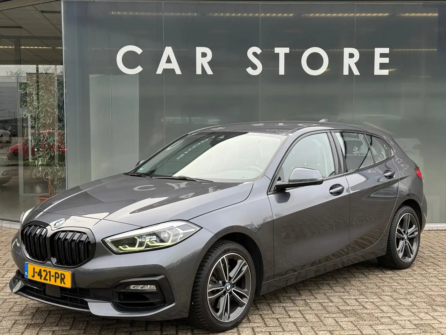 BMW 118 1-serie 118i AUT Executive SPORT Sportstoelen|LED| Grau - 1