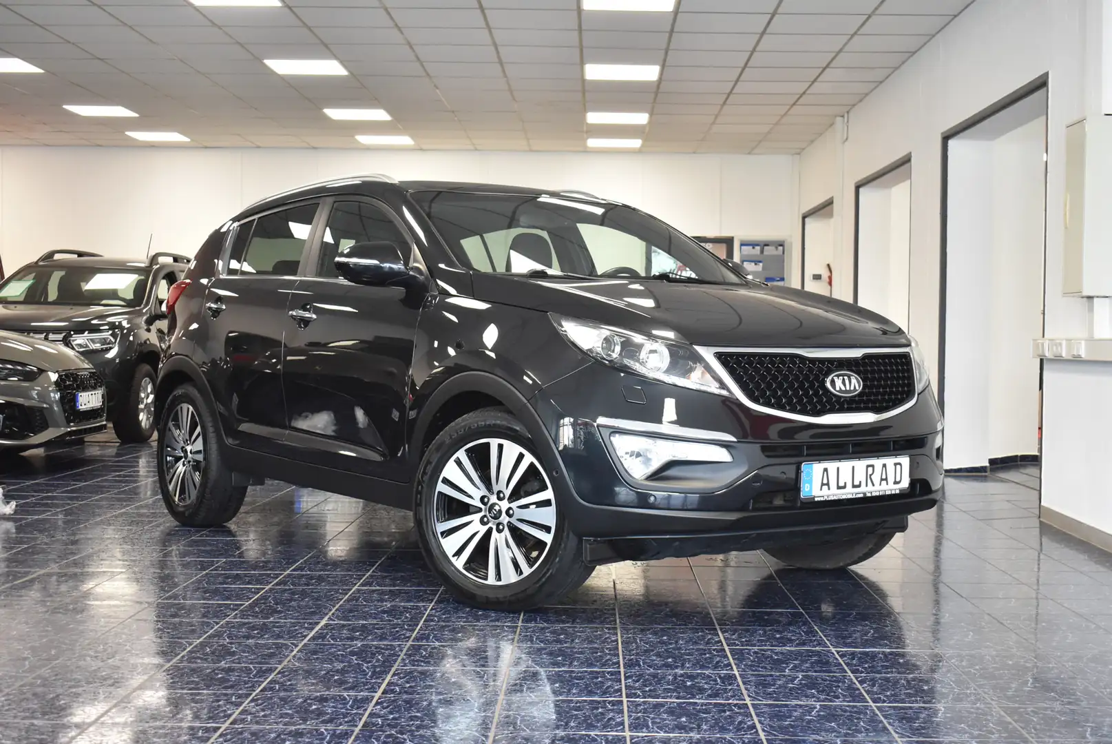 Kia Sportage Platinum 4WD Aut Navi Kamer Panoram AHK Schwarz - 1