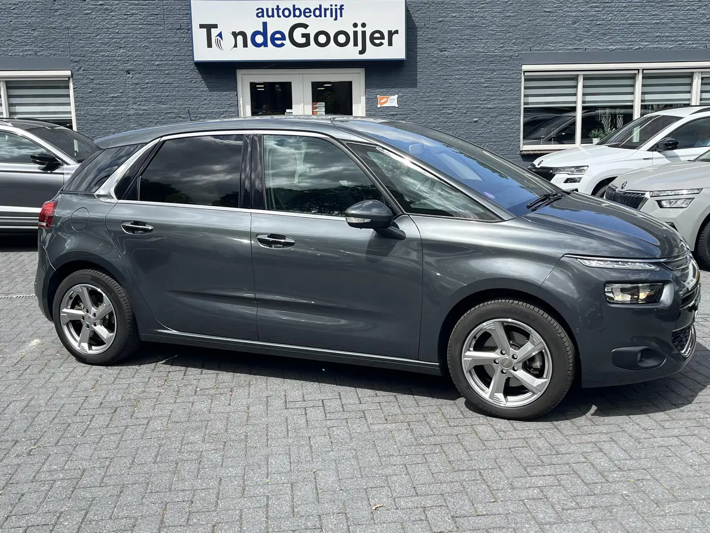 Citroen C4 Picasso 1.6 e-THP Aut. Intensive | NL-AUTO | 1e EIG. | TRE Gris - 1