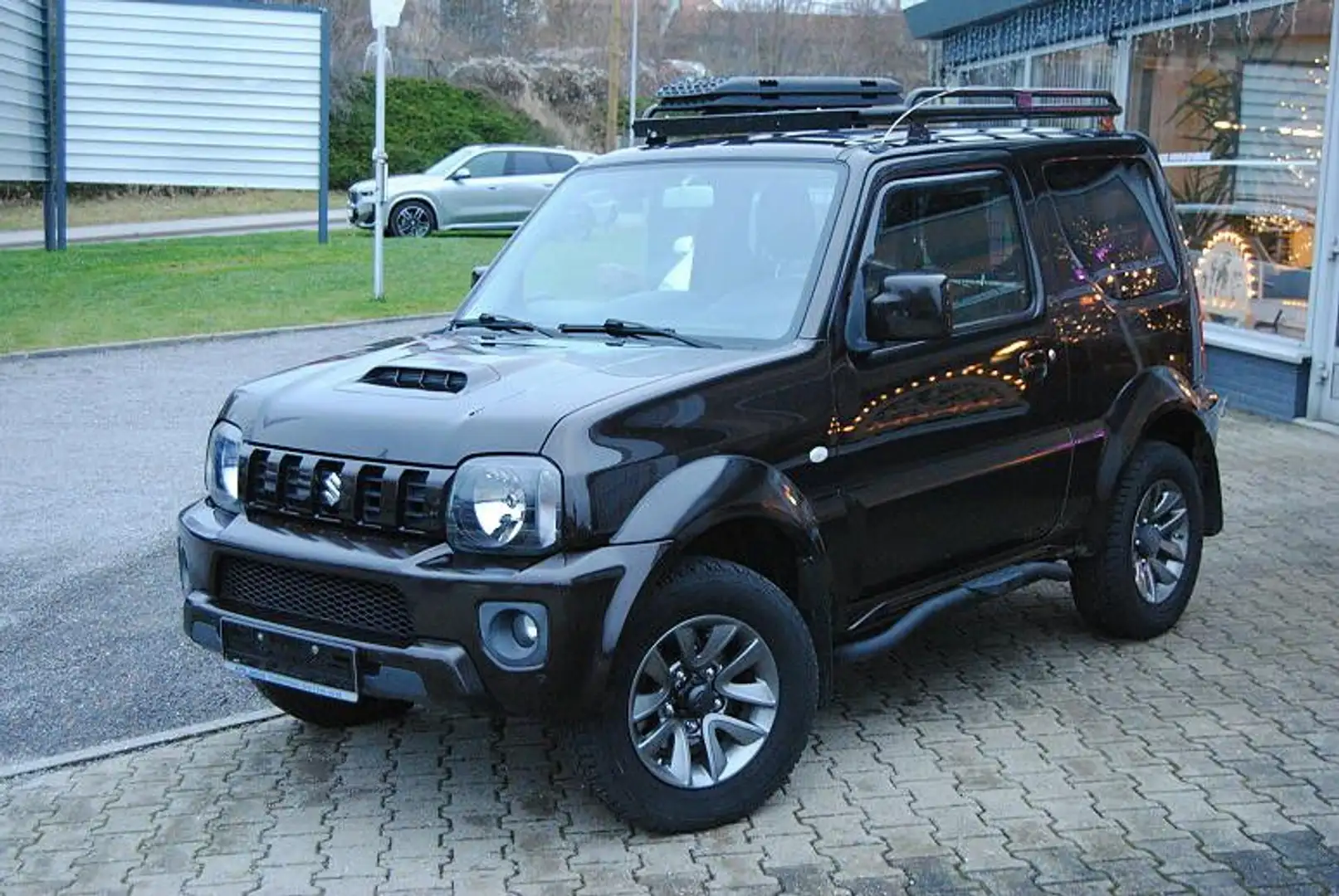 Suzuki Jimny 1.3 ALLGRIP Comfort.Sitzh.Klima.Neuwertig Schwarz - 1