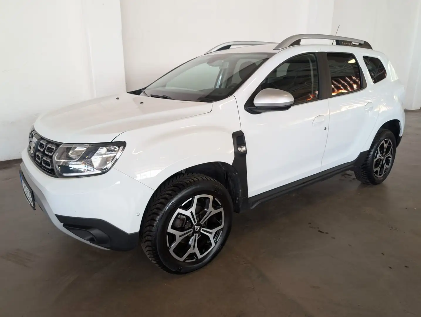 Dacia Duster 1.6 SCe 115 Prestige Weiß - 1