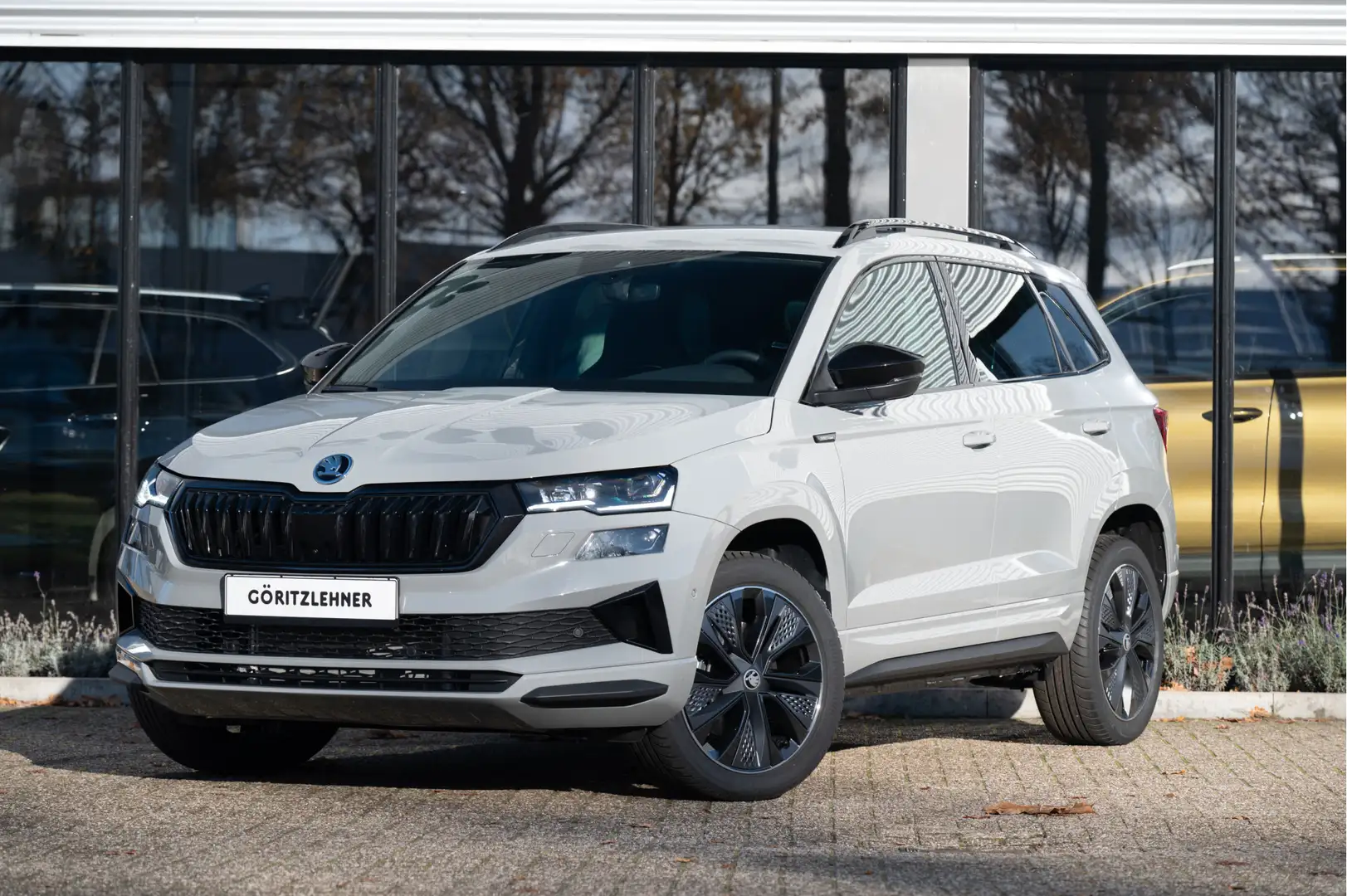 Skoda Karoq 1.5 TSI 150pk DSG Sportline Business | Trekhaak | Gris - 1