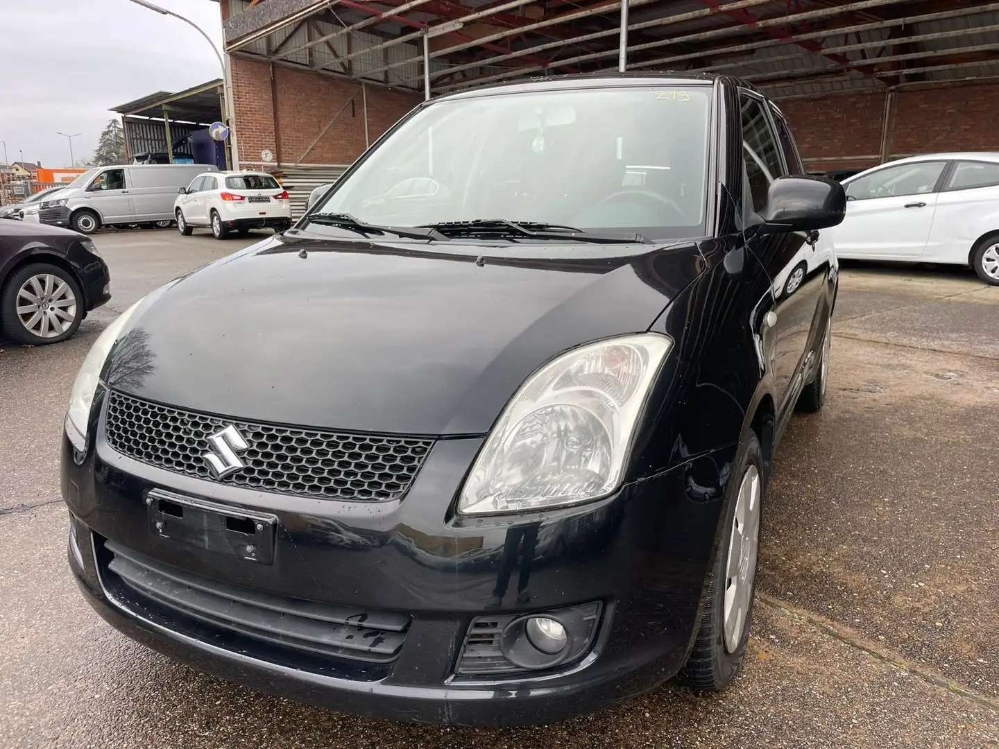 Suzuki Swift Lim. Comfort 4x4/KLIMA/KEIN TÜV Schwarz - 1
