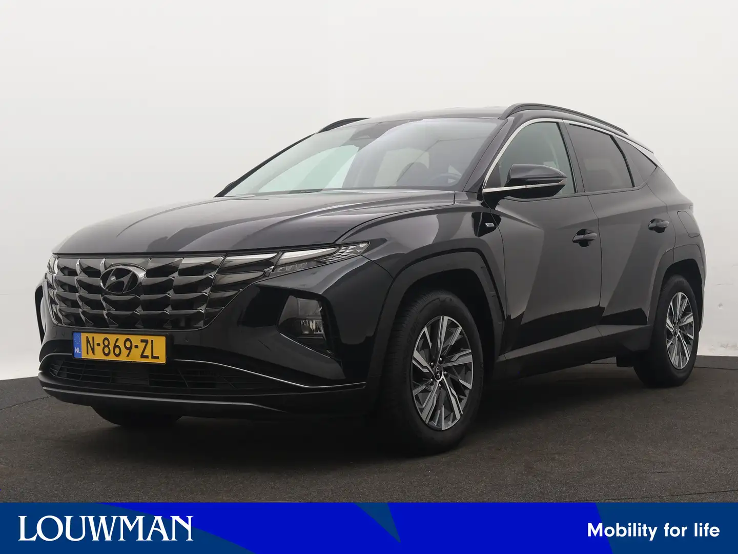 Hyundai TUCSON 1.6 T-GDI MHEV Comfort | Trekhaak | 1e Eigenaar | Schwarz - 1