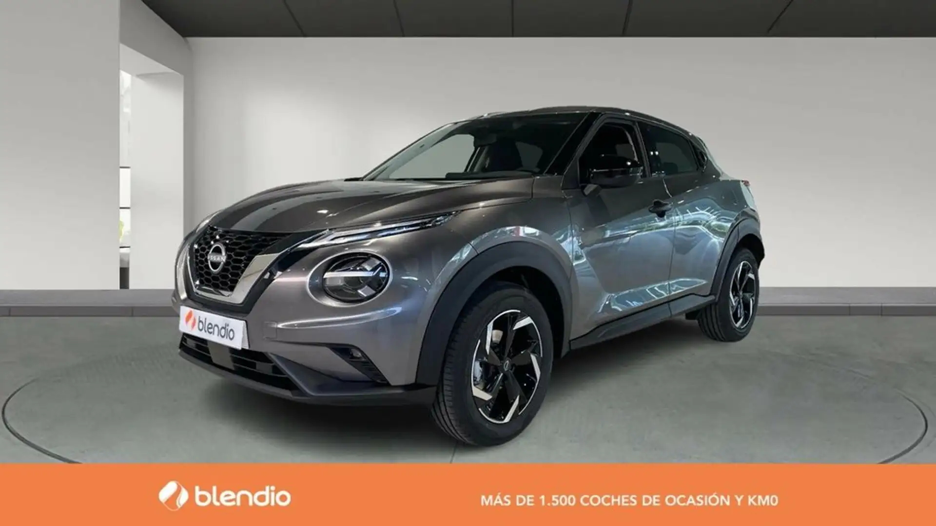 Nissan Juke 1.2 DIG-T Acenta 4x2 115 Grijs - 1