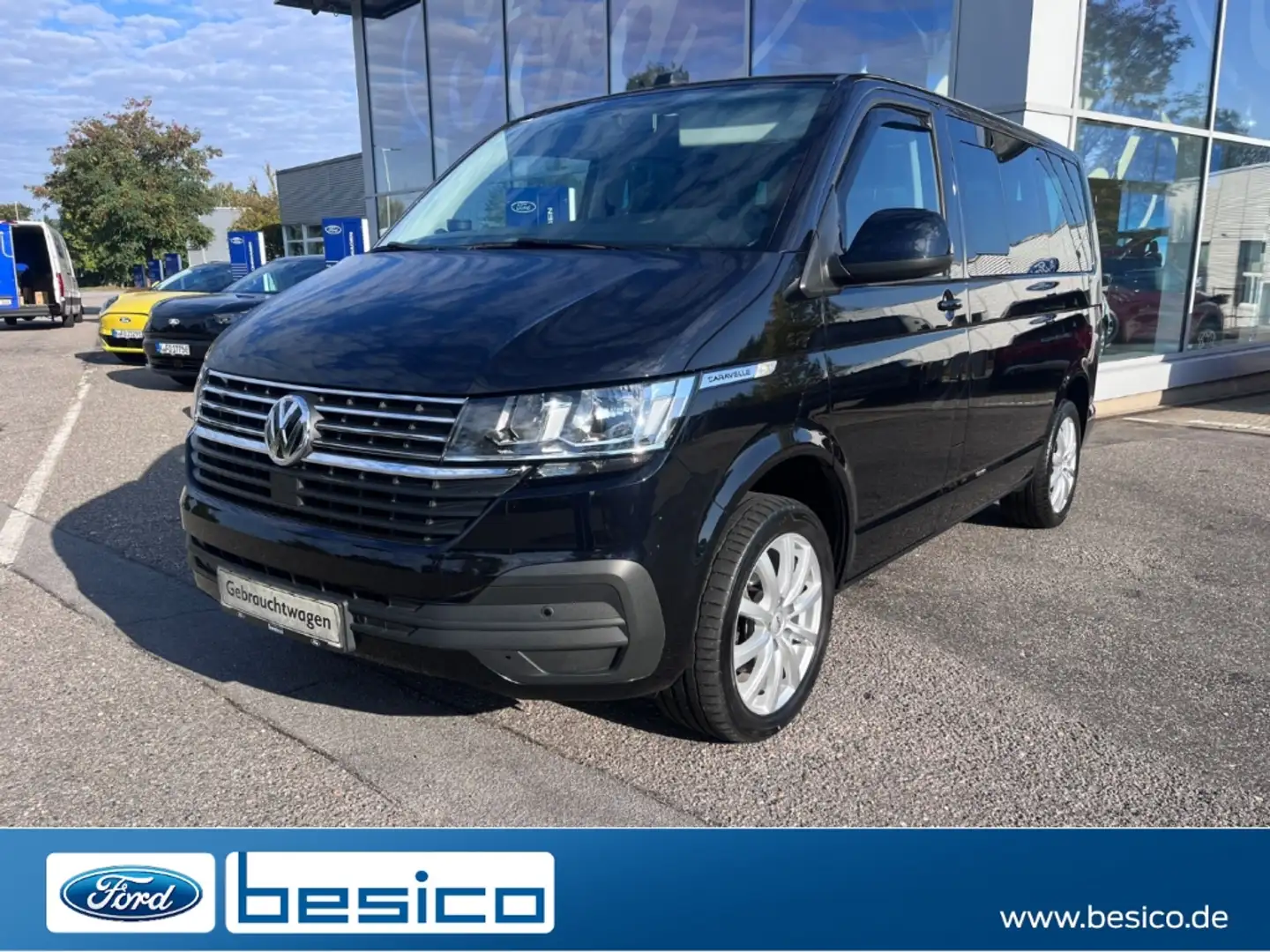 Volkswagen T6.1 Caravelle Comfortline+NAV+DAB+AHK+PDC+Temp+ Zwart - 1