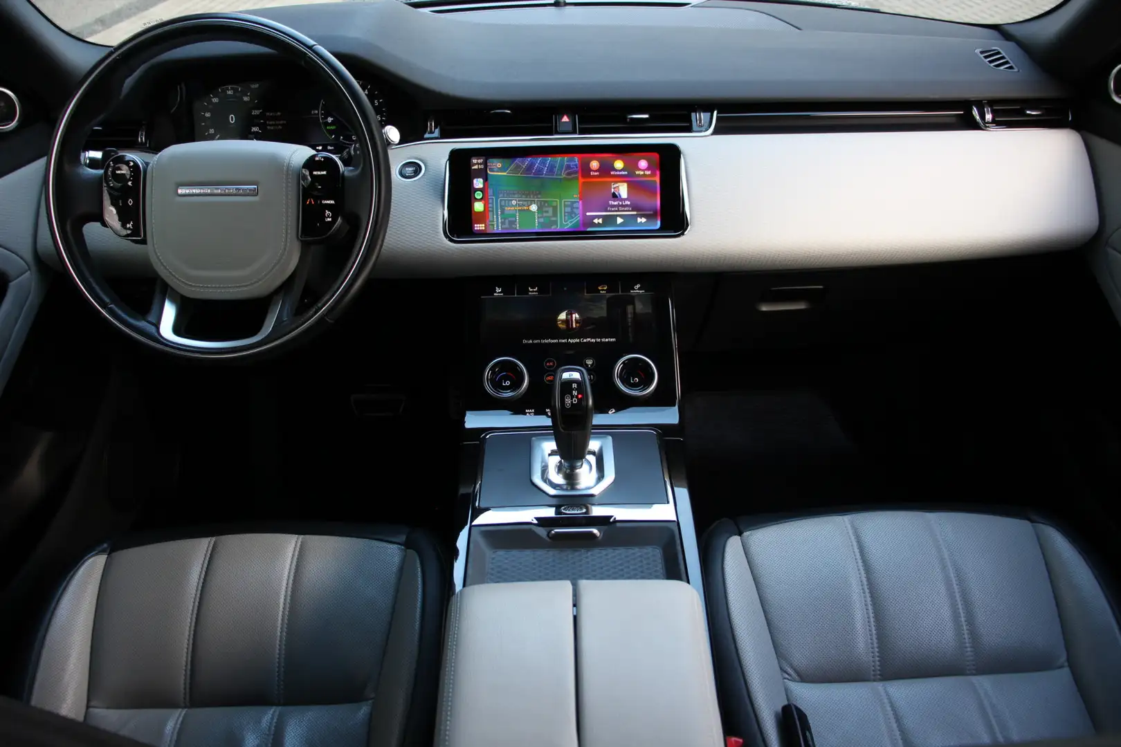 Land Rover Range Rover Evoque 1.5 P300e AWD R-Dynamic SE | Pano. | Leer | Meridi Zwart - 2